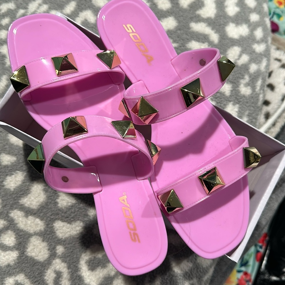 Vibrant pink slip on sandal w gold accent